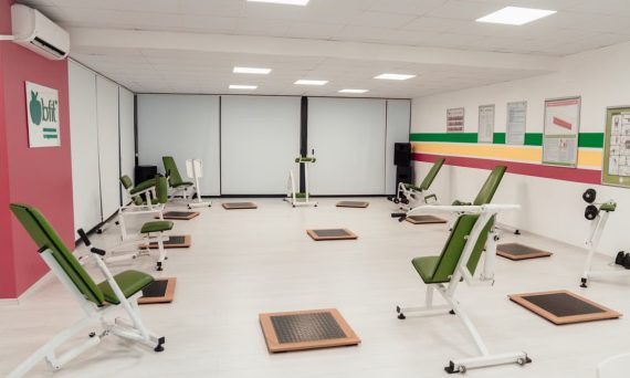 Bright and spacious gym interior featuring modern green exercise machines in Yalova.